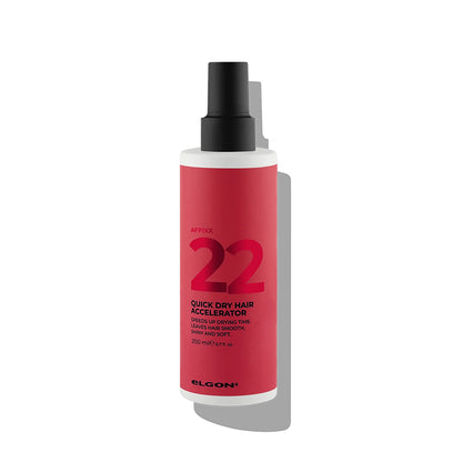 Flacone bianco con etichetta rossa con scritte nere e tappo spray nero.