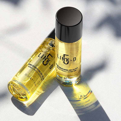 Due flaconi trasparenti con tappo nero da 30ml.