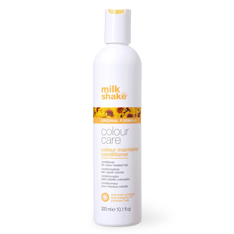 Bottiglia bianca con scritte in giallo, tappo flip top bianco e giallo. Immagine frontale che ricorda un campo di girasoli.