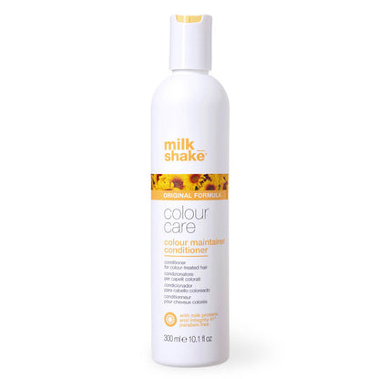 Bottiglia bianca con scritte in giallo, tappo flip top bianco e giallo. Immagine frontale che ricorda un campo di girasoli.